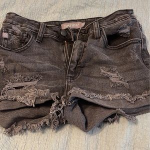 black ripped jean shorts